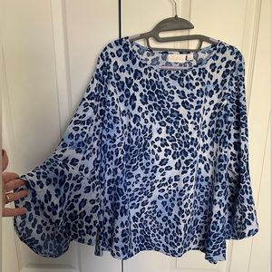 Kim Gravel, QVC Belle, blue animal print top.